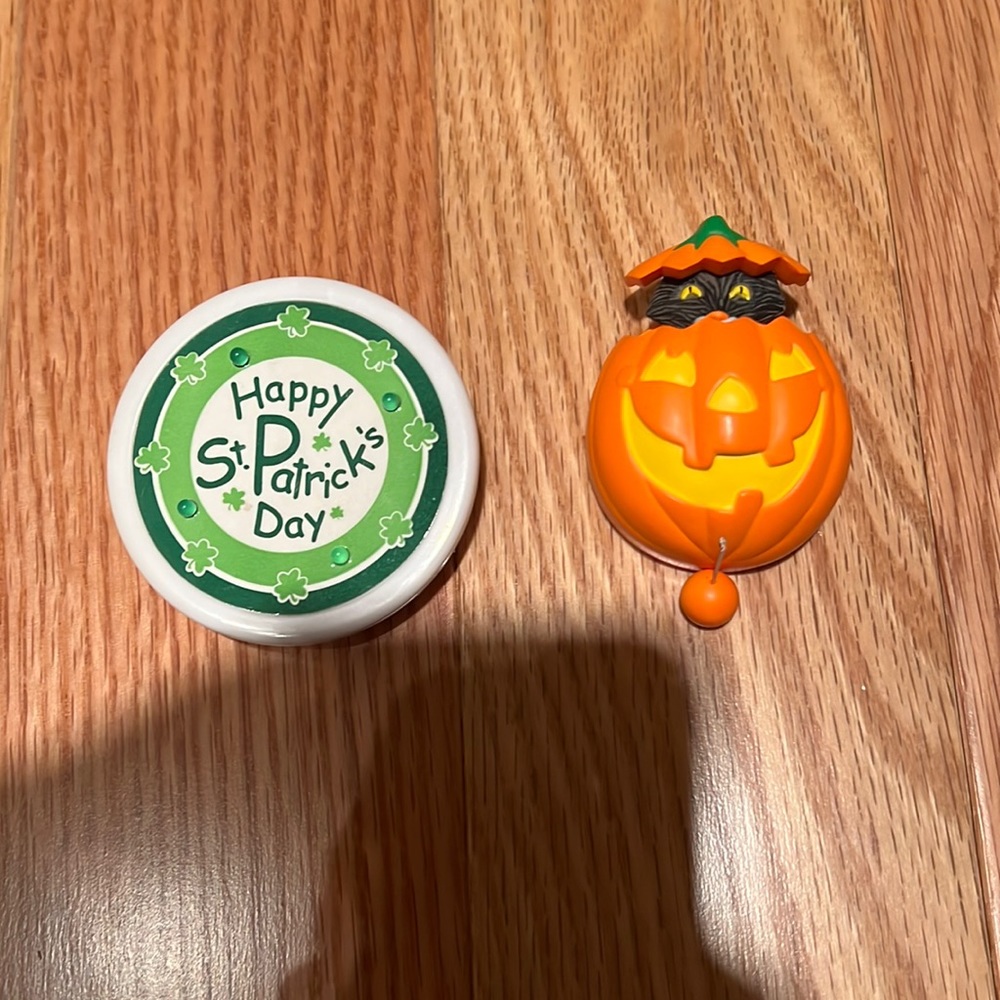 Two Holliday pins